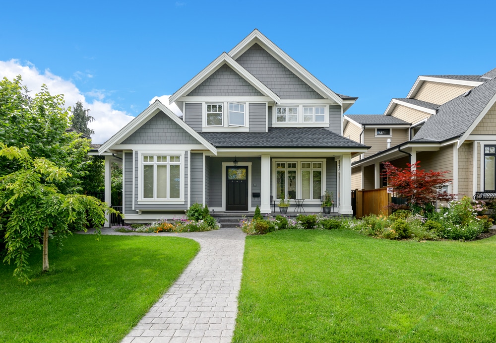 Luxury,House,With,Beautiful,Landscaping,On,A,Sunny,Day.,Home house for sale