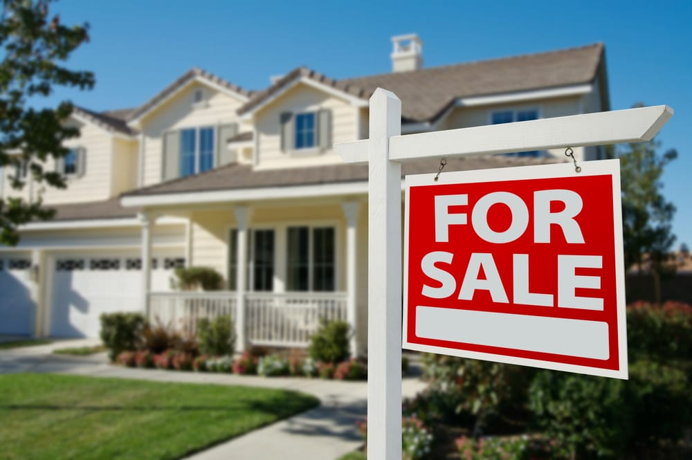 Home,For,Sale,Real,Estate,Sign,In,Front,Of,New house for sale