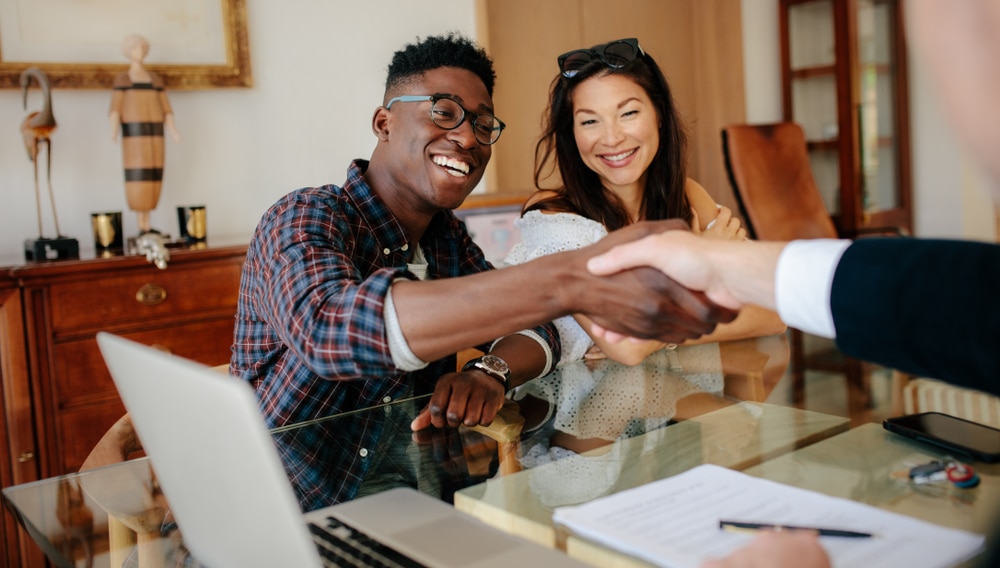 Happy,Property,Owners,Shaking,Hands,With,Real,Estate,Broker,After Happy,Property,Owners,Shaking,Hands,With,Real,Estate,Broker,After
